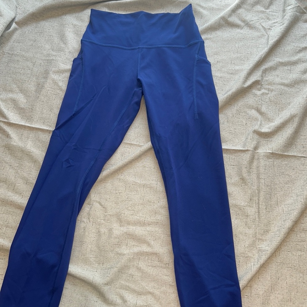 Lululemon Blue Wunder Train Leggings with Pockets 25 inch inseam Size 6